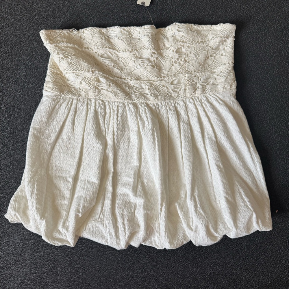 Anthropologie strapless, bubble hem top. Size Large NWT
